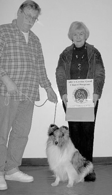 Ken and Am/Can Ch MYNE Now and Forever with Instructor MaryAnn Bourgeois after completing the CGC and TDI Testing in April 2006. Congratulations, Fred and Ken!
